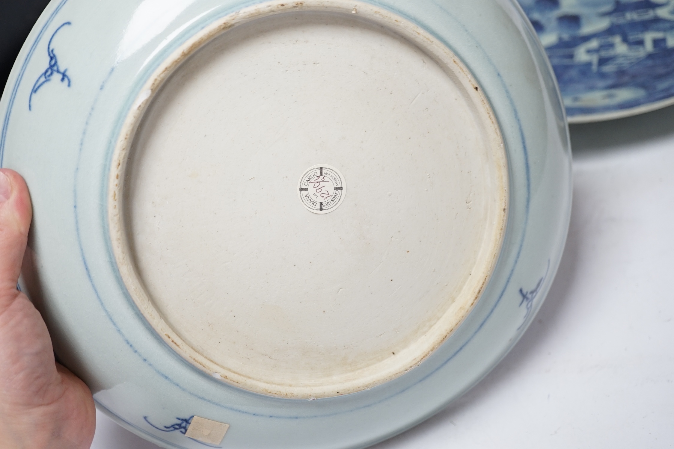 A 19th century Chinese celadon glazed blue and white landscape dish and a Diana Cargo dish, landscape dish 29.5cm diameter